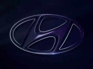 FILE PHOTO: The logo of Hyundai Motor is seen on wall at a event of Hyundai Motor Co's new Accent in Mexico City