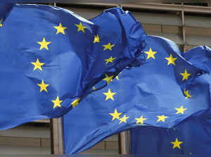 FILE PHOTO: European Union flags flutter outside the EU Commission headquarters in Brussels