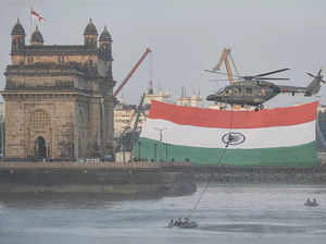 Mumbai: Indian Navy personnel display their skills during Navy week celebrations...