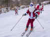 The Yuletide spirit: Skiing Santas in red suits take over Maine slopes to raise money for charity