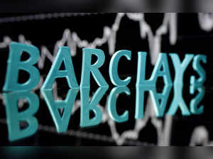 FILE PHOTO: FILE PHOTO: FILE PHOTO: FILE PHOTO: The Barclays logo is seen in front of displayed stock graph in this illustration