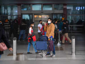 New Delhi: Travellers arriver at Terminal-3 of Indira Gandhi International Airpo...