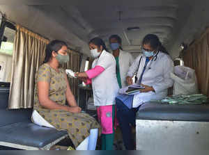 Bengaluru: A health worker administers a dose of COVID-19 vaccine to a beneficia...