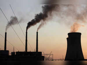 FILE PHOTO: Cooling towers are seen at a coal fired power station in Hwange