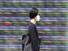 Japanese shares end lower on Omicron fears, SoftBank falls
