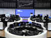 European shares inch up in thin trading