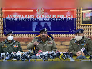Srinagar: Director General of Jammu and Kashmir Police Dilbagh Singh (C) along w...