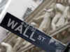 Wall St falls back into red on euro-zone woes, data