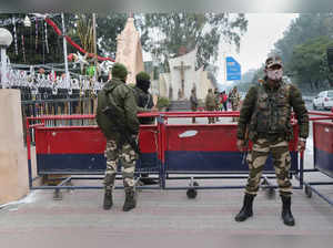 Jammu: Security personnel guard at Saint Mary's Garrison church, during Christma...