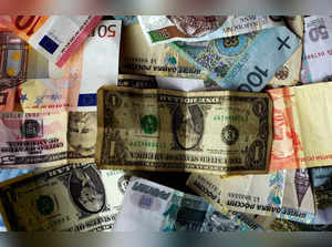 FILE PHOTO_ Bank notes of different currencies are photographed in Frankfurt, Germany, in this illustration picture.