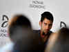 Novak Djokovic held at airport for eight hours 'mostly incommunicado': lawyers