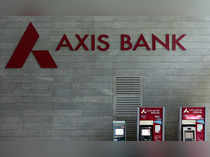 Axis Bank's logo is seen next to ATM machines at its corporate headquarters in Mumbai