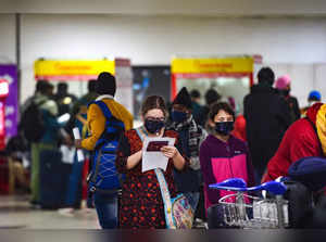 New Delhi: Air travellers get themselves registered for Covid-19 tests, at T-3 t...