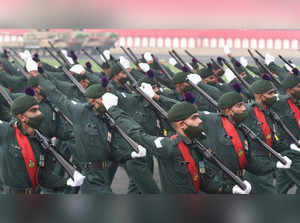 New Delhi: Army jawans march past during the full dress rehearsal for the Army D...
