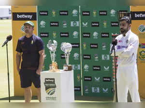 Cape Town: Indian captain Virat Kohli and South African captain Dean Elgar durin...