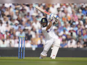 London: India's Virat Kohli plays a shot for four off the bowling of England's J...