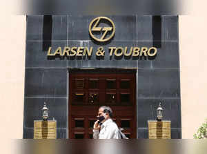 A man walks past the Larsen and Toubro (L&T) head office in Mumbai