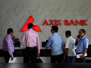 FILE PHOTO: Visitors wait at the reception of Axis Bank's corporate headquarters in Mumbai