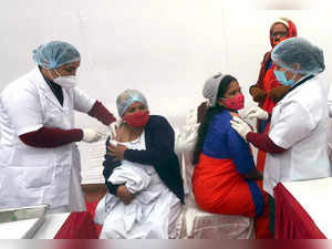 Bhopal, Jan 16 (ANI): Healthcare workers administer a dose of COVID-19 vaccine t...