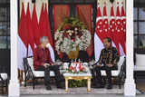 Indonesia, Singapore sign key defence, extradition treaties in presence of nation leaders