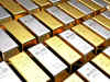 Gold flat; set for biggest weekly dip in 10 after hawkish Fed
