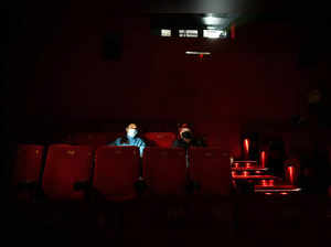New Delhi, Jan 28 (ANI): People watch a movie at PVR Plaza as cinema theatres op...