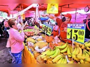 High Inflation to Stick This Year, Denting Global Growth