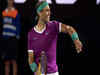 Rafael Nadal comes from two sets down to make history with 21st Slam