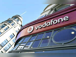 FILE PHOTO: Branding for Vodafone is seen on the exterior of a shop in London, Britain