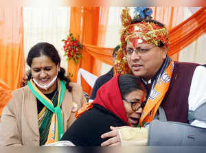 Khatima, Jan 28 (ANI): Uttarakhand CM Pushkar Singh Dhami  interacts with women ...