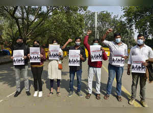 New Delhi: Students hold placards as they stage a protest against Tamil Nadu's g...