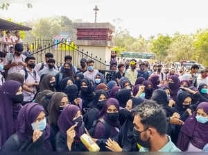 **EDS: BEST QUALITY AVAILABLE** Udupi: Students wearing hijab stage a protest ou...