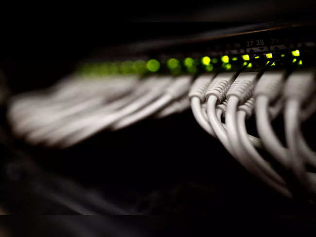 FILE PHOTO: RJ45 cables are pictured inside the data centre operated by French telecoms operator Iliad in Paris