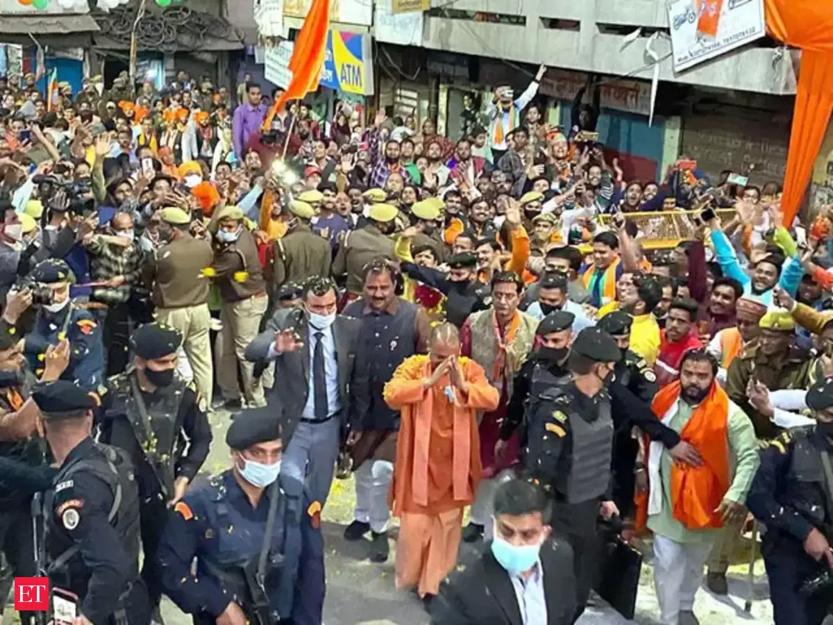 UP Elections 2022: CM Yogi Adityanath holds massive roadshow in Jhansi ...