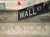 Wall Street pares losses, gyrates after release of Fed minutes