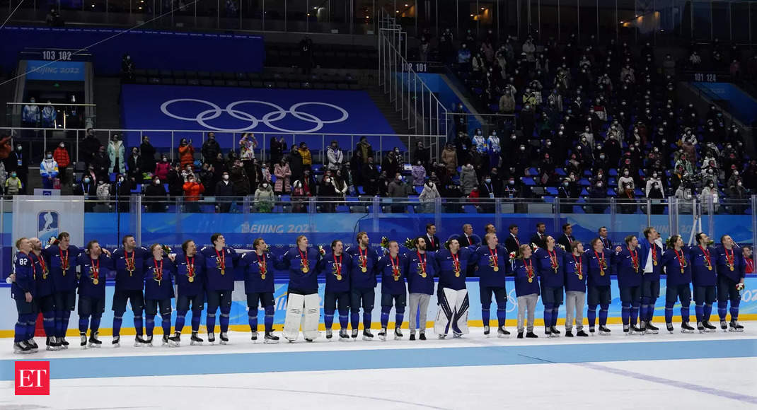 Beijing’s Olympics close, ending safe but odd global moment