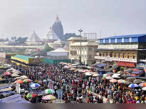 Puri: Devotees arrive to visit Jagannath temple as the temple administration ann...