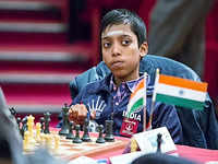 r praggnanandhaa: Beaming picture of R Praggnanandhaa's mother Nagalakshmi  goes viral; Snapdeal boss Kunal Bahl wants documentary on chess champ - The  Economic Times