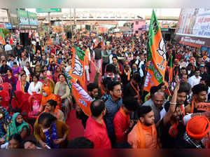 Lucknow, Feb 18 (ANI): Bharatiya Janata Party (BJP) supporters holding party fla...