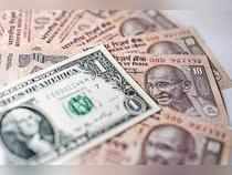 Bloodbath in forex market as rupee tumbles over 100 paise vs dollar