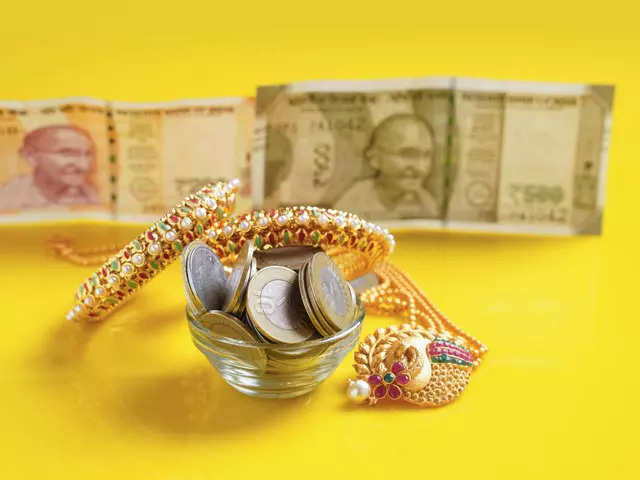 Gold loan process: All you need to know about borrowing against the yellow  metal - ​How does a gold loan work? | The Economic Times