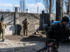 Russians besiege Ukrainian ports as armored column stalls