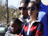 Obama family listen to their guide during a safari in Madikwe Game Reserve