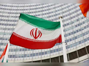 FILE PHOTO: The Iranian flag waves in front of the International Atomic Energy Agency (IAEA) headquarters in Vienna