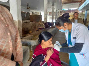 Patiala: A healthcare worker administers a dose of Covid-19 preventive vaccine t...
