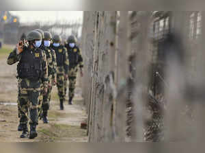 Jammu: Border Security Force (BSF) personnel patrol at international border ahea...
