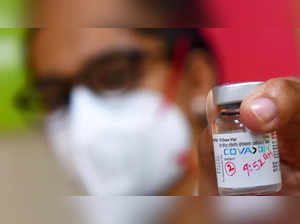 A health worker shows a vial of Covaxin, a Covid-19 vaccine TNN