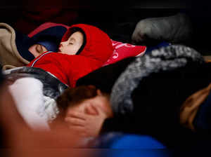 Children sleep after fleeing Russia's invasion of Ukraine