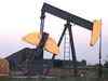 Crude oil hits 4-month low on strong US dollar