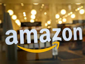 The logo of Amazon is seen on the door of an Amazon Books retail store in New York